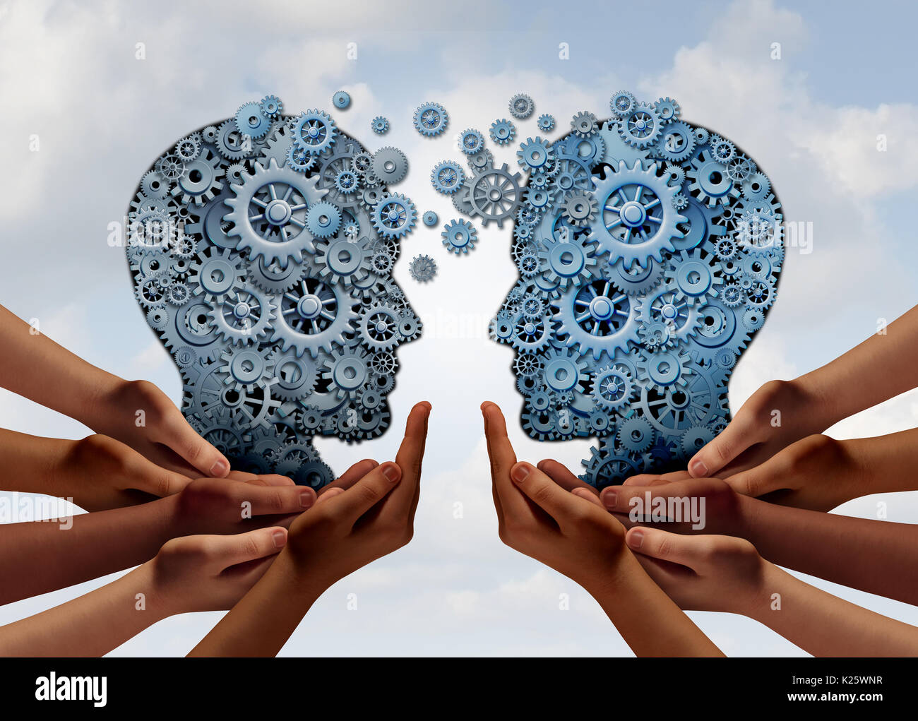 Business Team Technology as the mechanism of gear and cogs connected together in the shape of a human head as two groups. Stock Photo