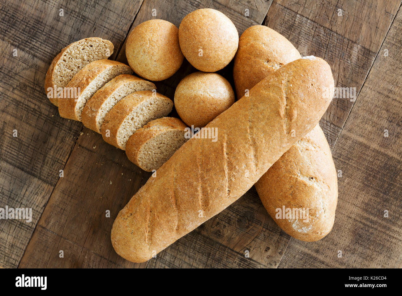 Bread rolls on a bread board Stock Photo