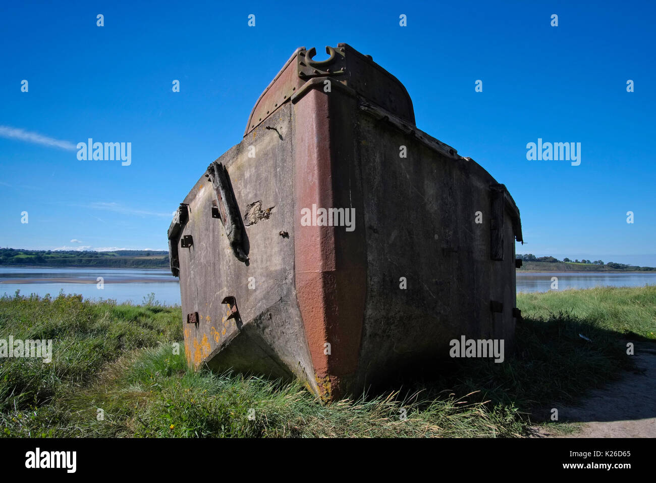 A concrete barge (ferrocement) FCB 75, in the Purton Ship's Graveyard (Purton Hulks), one of many vessels beached on the bank of the River Severn. Stock Photo