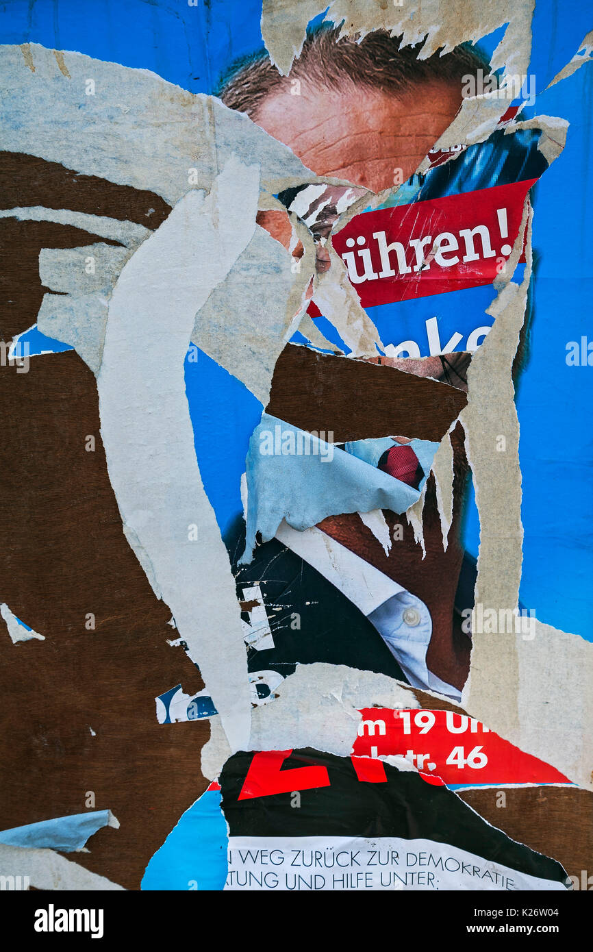 Torn electoral placard, Munich, Oberbayern, Bavaria, Germany Stock Photo