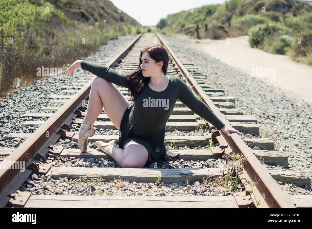 Sitting on train tracks hires stock photography and images Alamy
