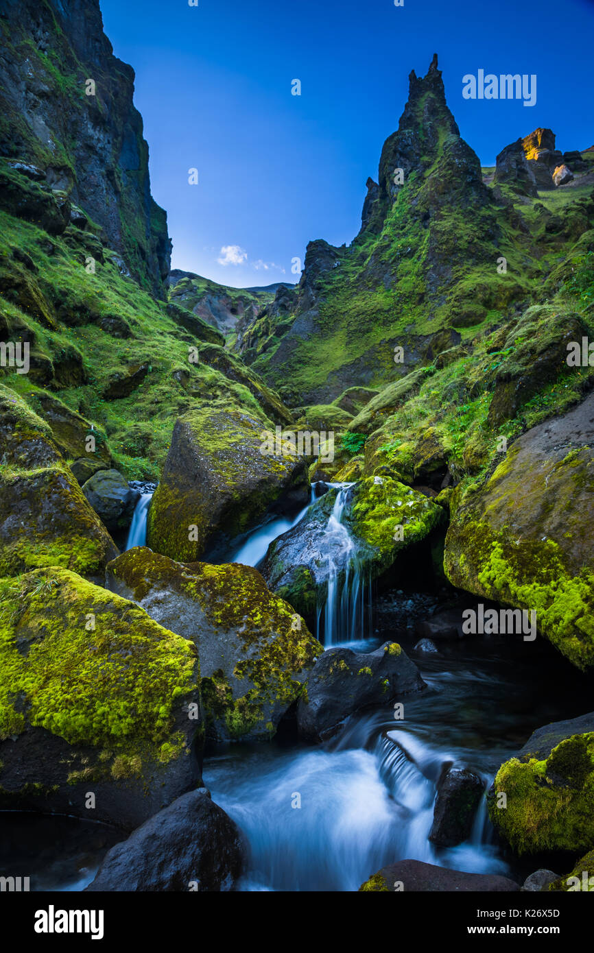 Moss, rocks, and cascading water at Thakgil Canyon Stock Photo