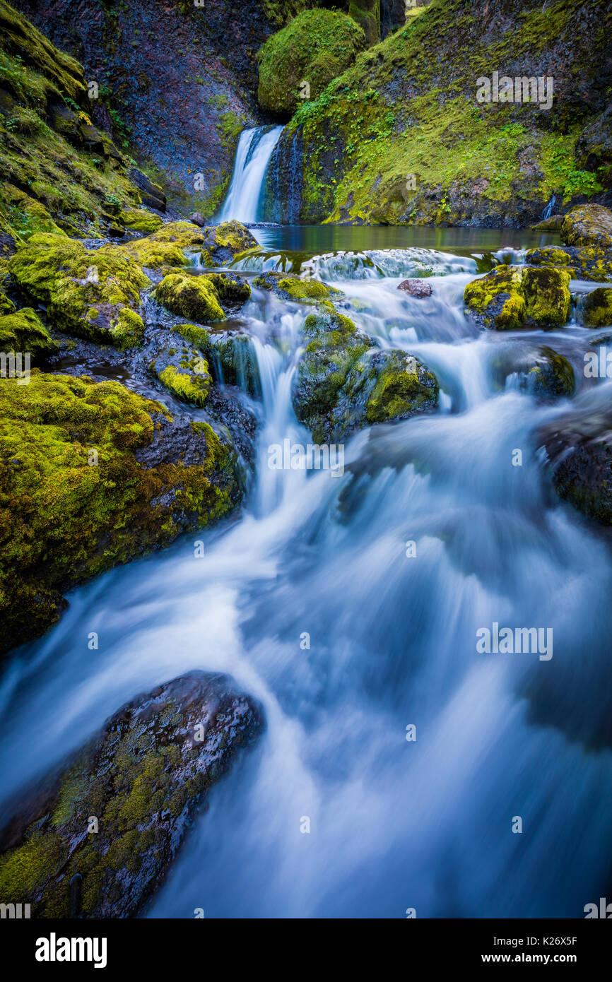 Moss, rocks, and cascading water at Thakgil Canyon Stock Photo
