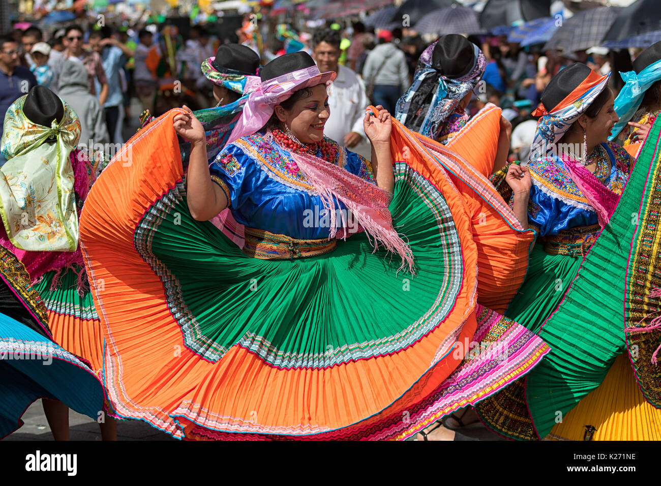June 17, 2017 Pujili, Ecuador: female dancer in traditional clothing in motion at the Corpus Christi annual parade Stock Photo