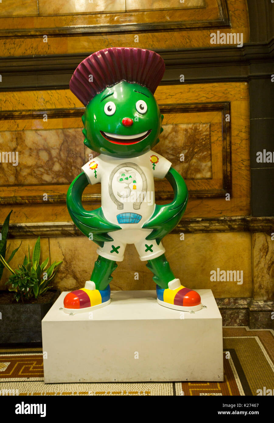 Clyde,a green fibreglass cartoon statue, official mascot of Commonwealth games 2014 in Glasgow, Scotland Stock Photo