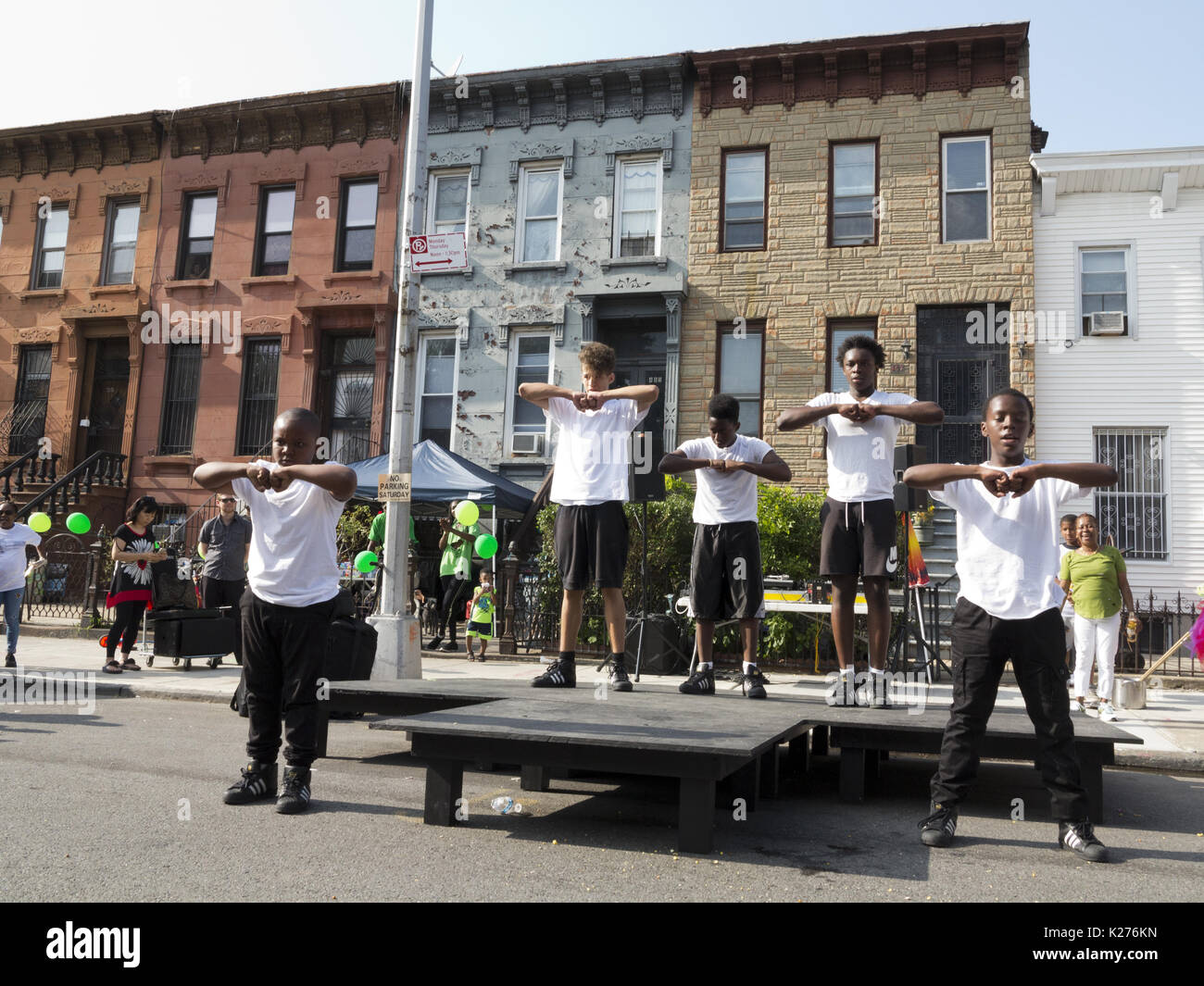 Boys entertaining at block party in the Bedford Stuyvesant section of Brooklyn, NY, Aug.26, 2017. Stock Photo