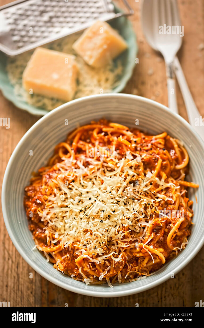 Spaghetti Bolognese with minced beef, tomato sauce, grated parmesan