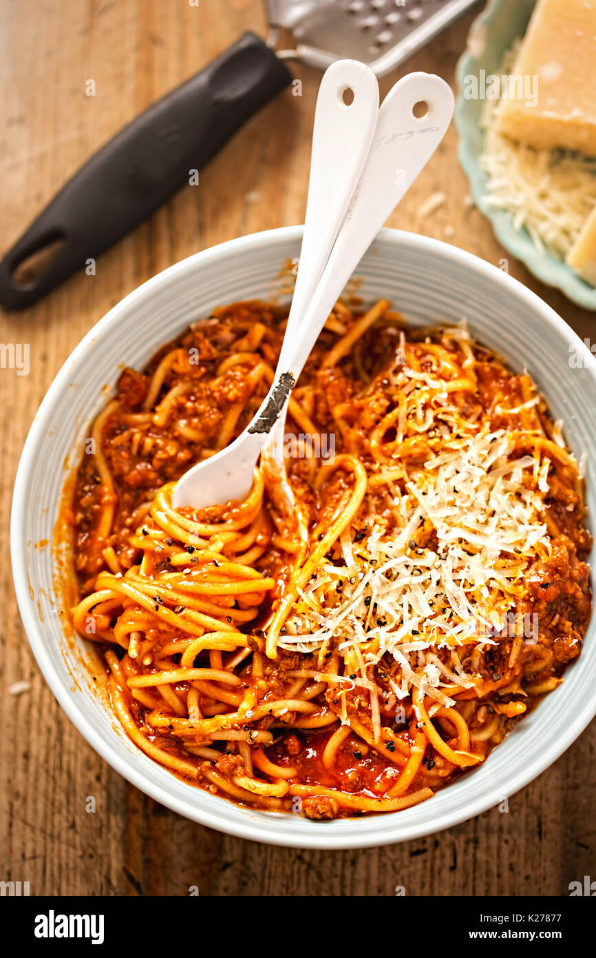Spaghetti Bolognese with minced beef, tomato sauce, grated parmesan