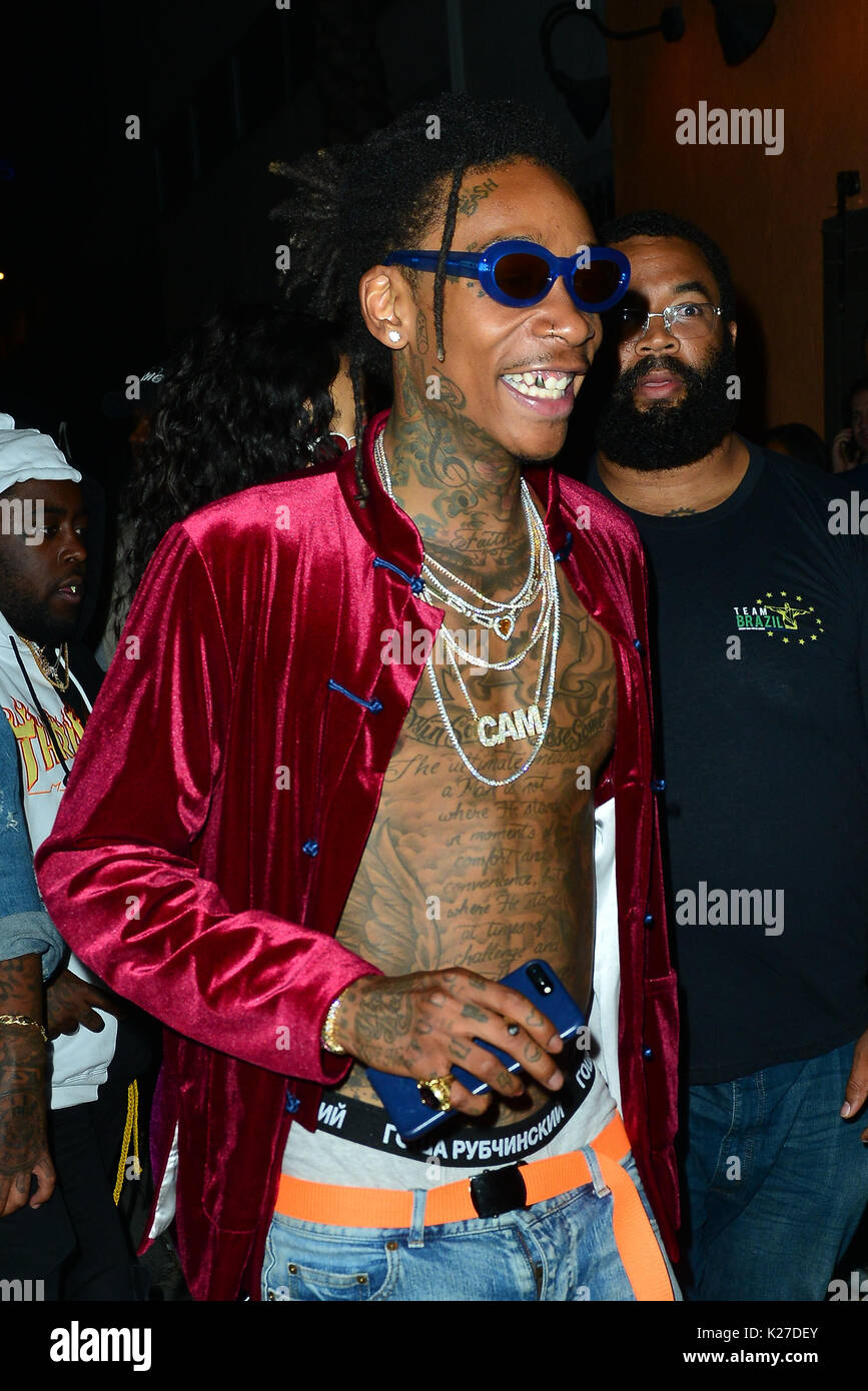 Wiz Khalifa and girlfriend Izabela Guedes leaving Warwick Night Club in Hollywood.  Featuring: Wiz Khalifa Where: Hollywood, California, United States When: 27 Jul 2017 Credit: WENN.com Stock Photo