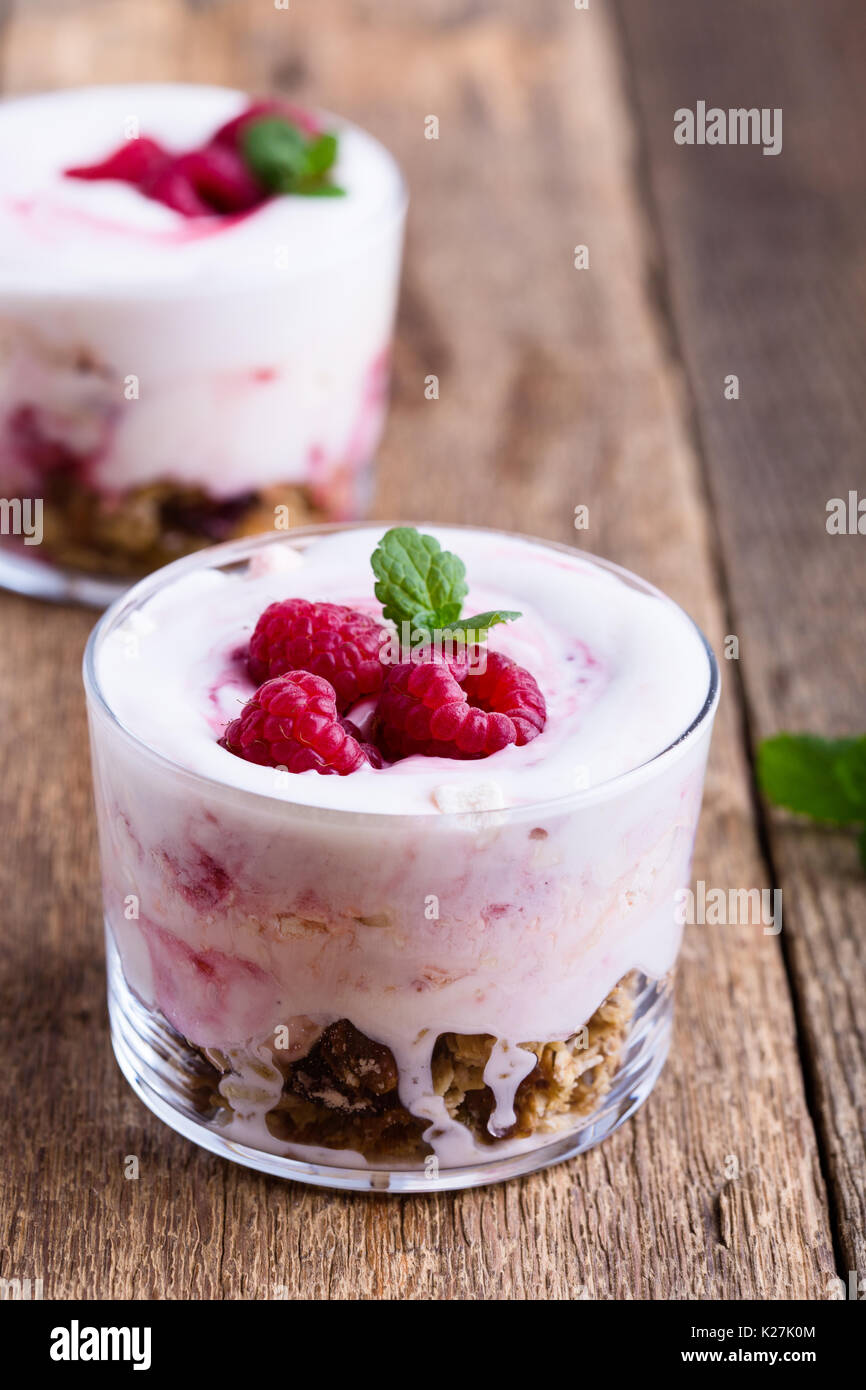 Raspberry trifle with crunchy toasted oats and dried fruit, eton mess style granola dessert