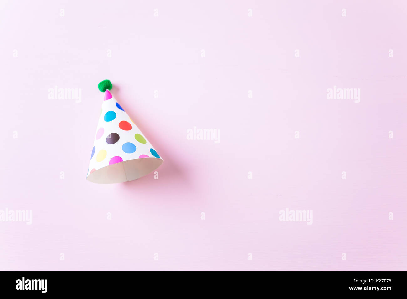 Colorful party hats for kids Birthday Party on pink background Stock ...