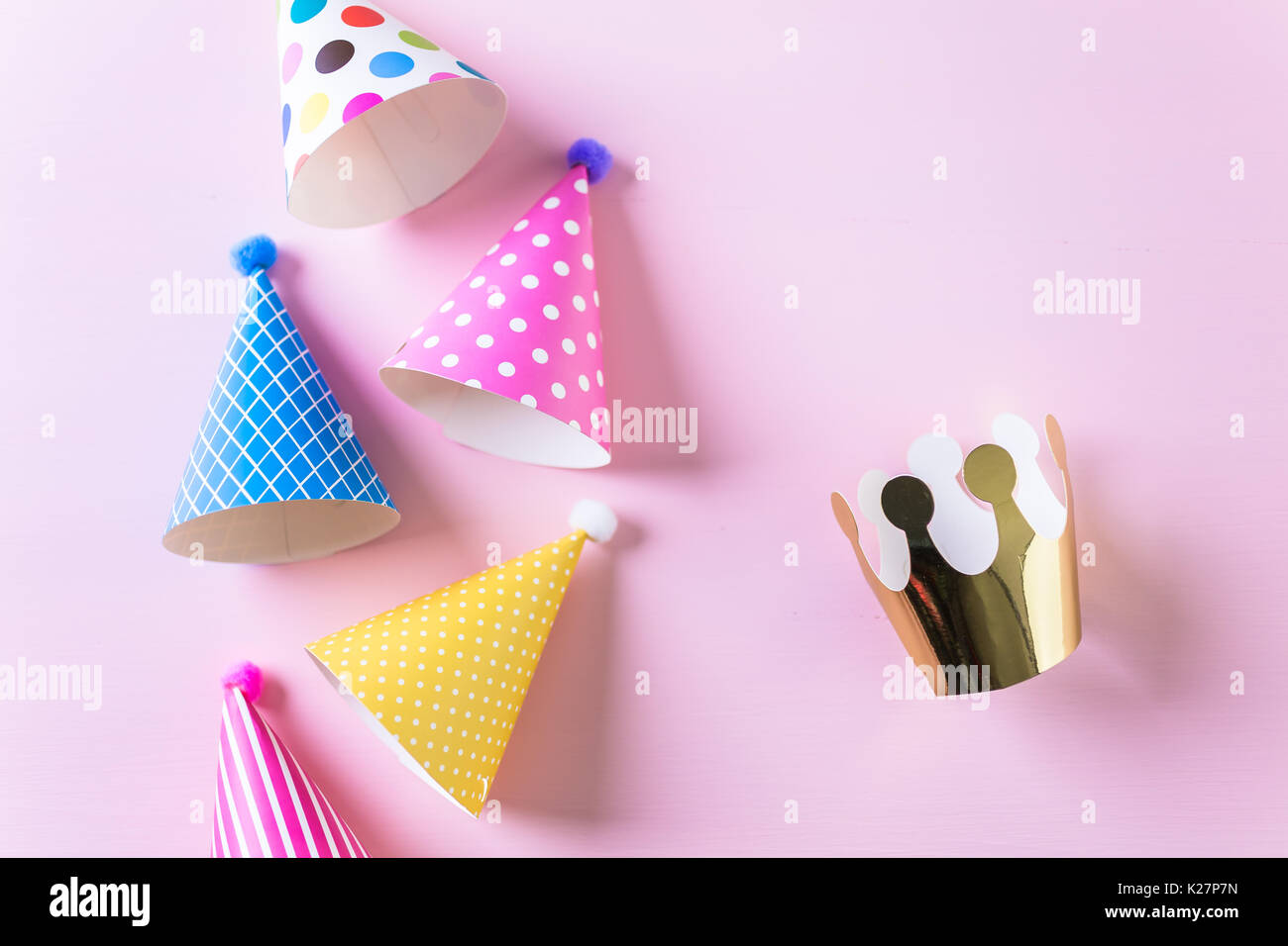 Colorful party hats for kids Birthday Party on pink background Stock ...