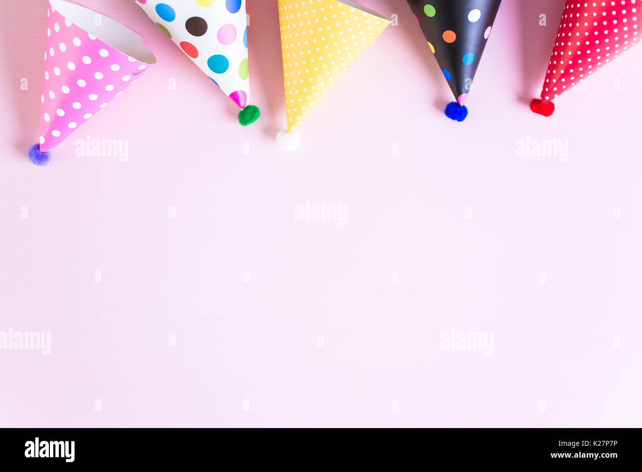 Colorful party hats for kids Birthday Party on pink background Stock ...