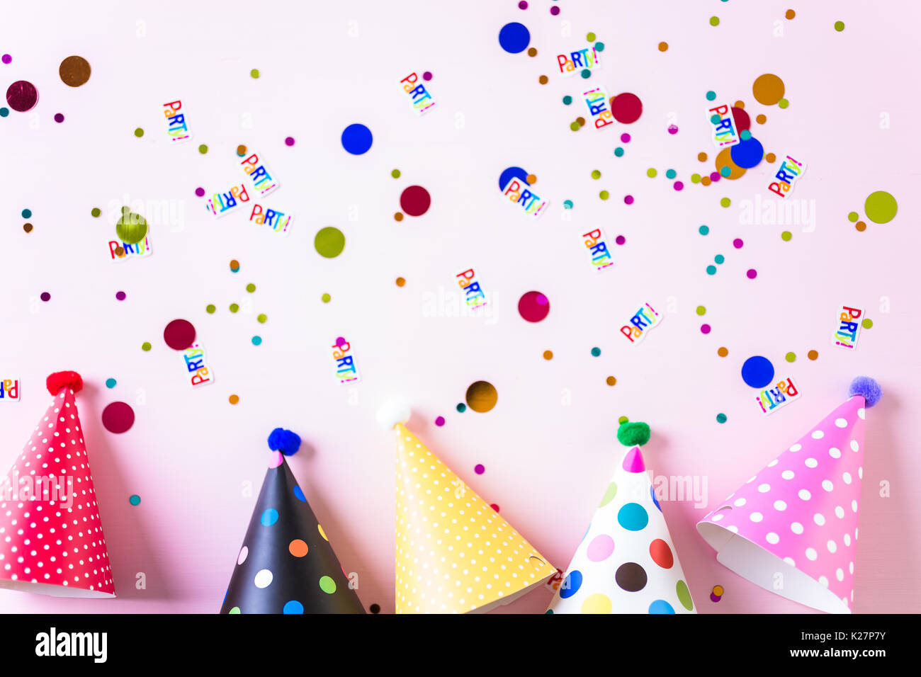 Colorful party hats for kids Birthday Party on pink background Stock ...