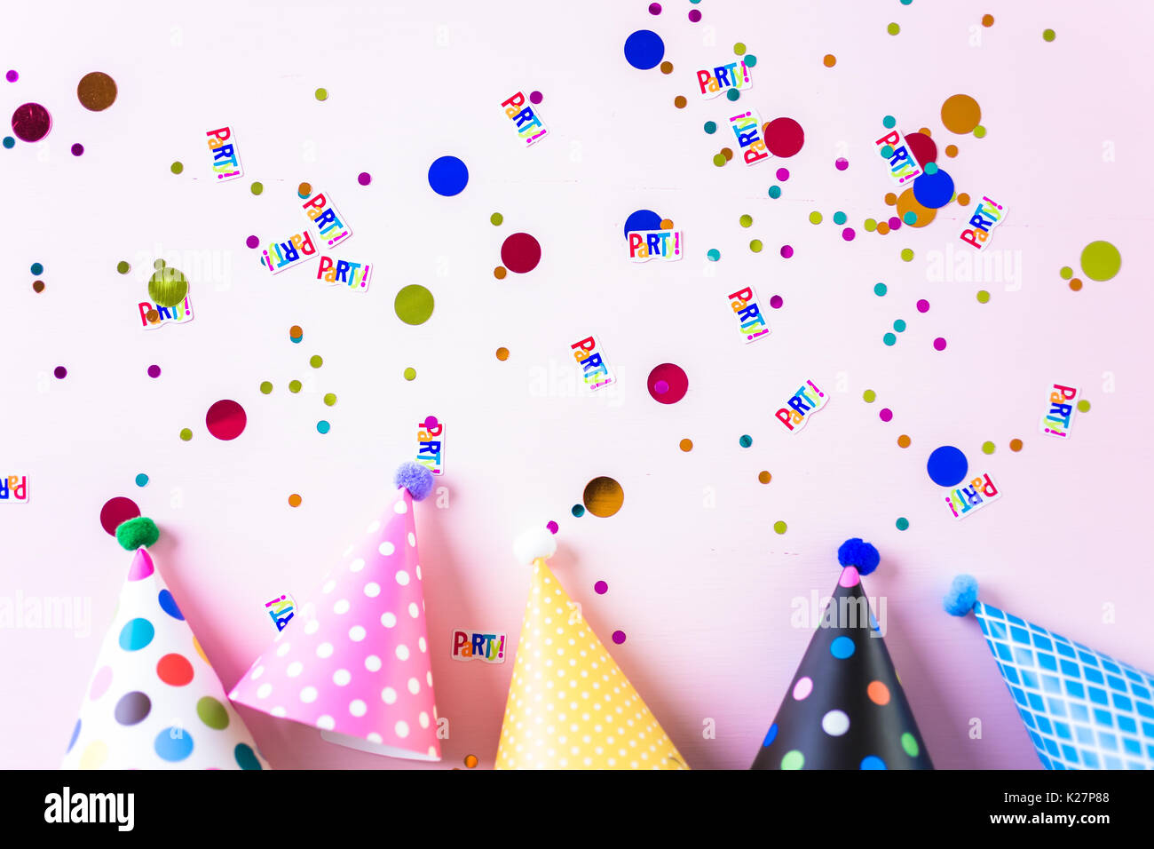 Colorful party hats for kids Birthday Party on pink background Stock ...
