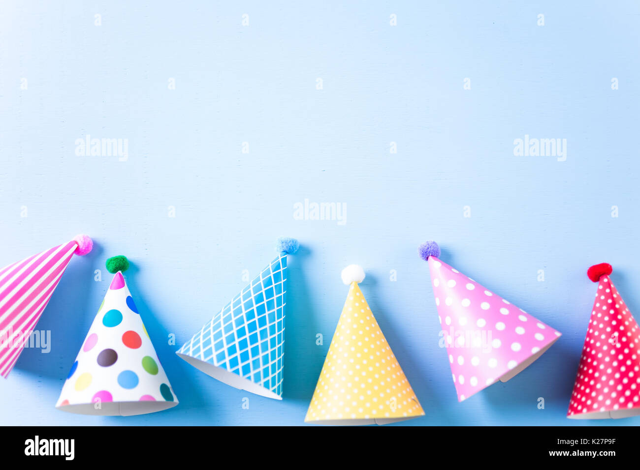 Colorful party hats for kids Birthday Party on blue background Stock ...