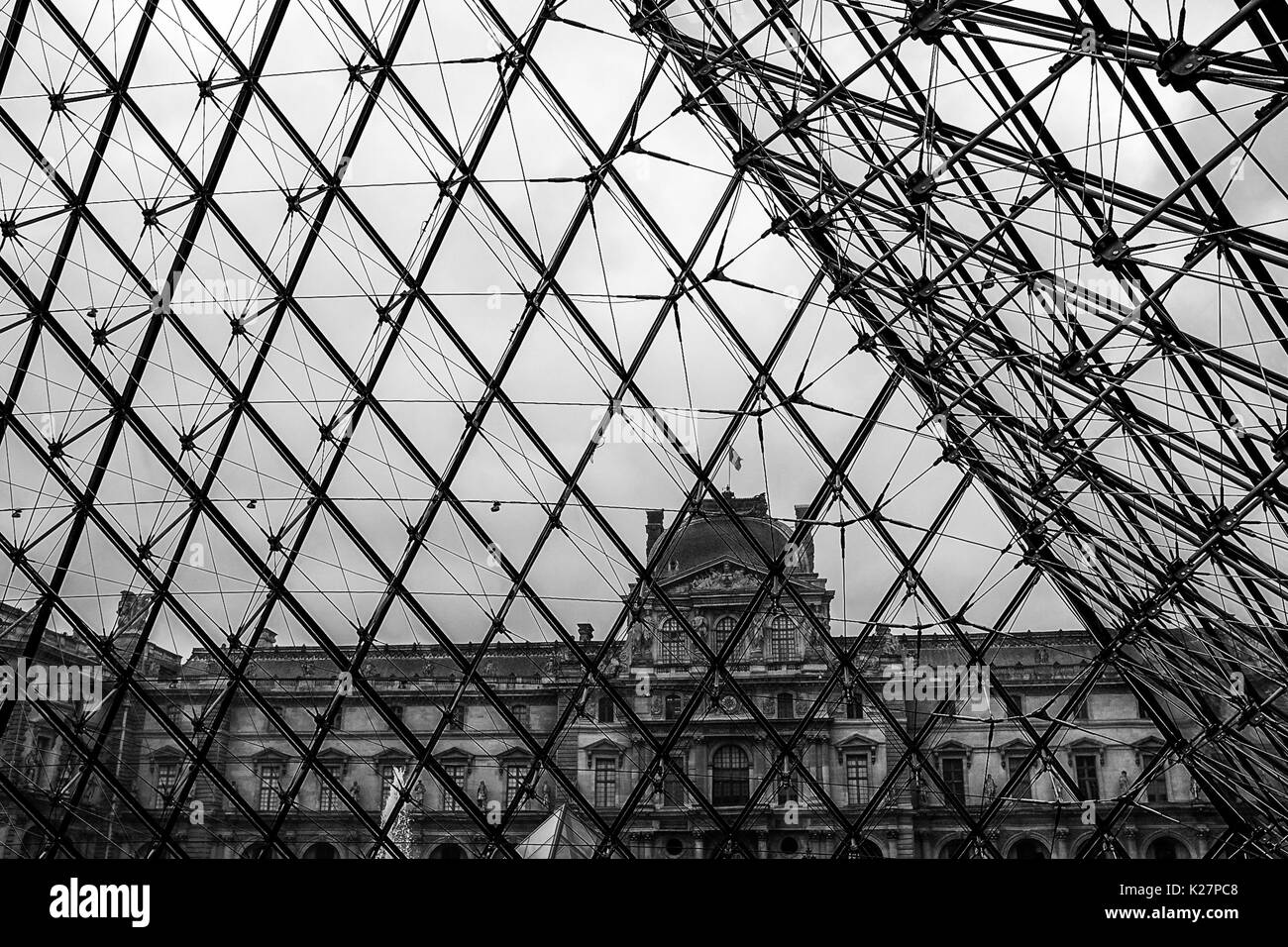 Interior and exterior photographs of The Louvre, including art, crowds, and symmetry in architecture on Sept 17, 2016. Stock Photo