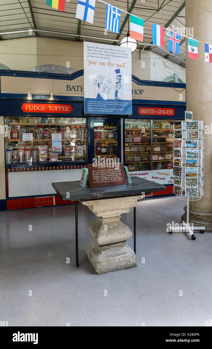 18th century ‘Nail’, a table on which market transactions took place, hence the saying, ‘pay on the nail’. Guildhall Market Bath, England, UK Stock Photo
