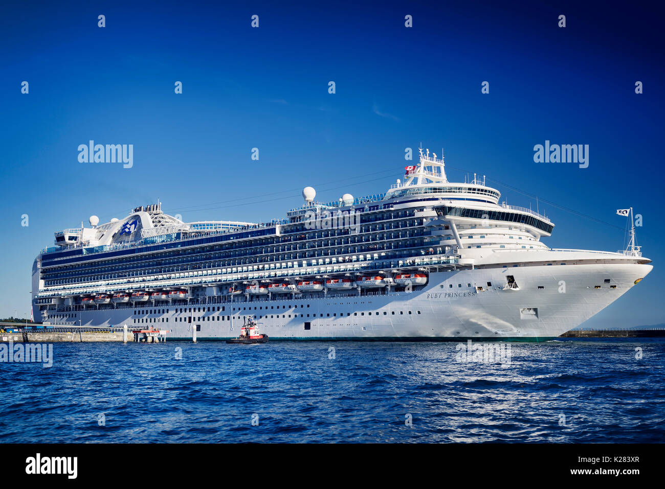 Ruby Princess grand-class cruise ship operated by Princess Cruises with people aboard docked in Victoria, Vancouver Island, BC, Canada 2017 Stock Photo