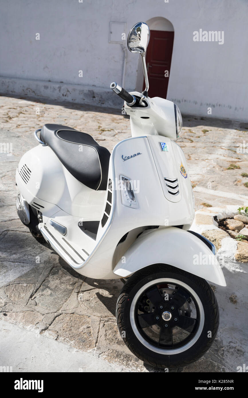 White Vespa scooter parked in an alley, Mykonos, Greece Stock Photo - Alamy