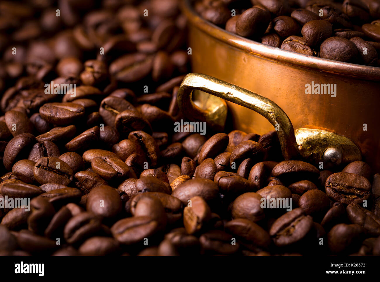 coffee beans with copper pot, full frame, closeup Stock Photo Alamy