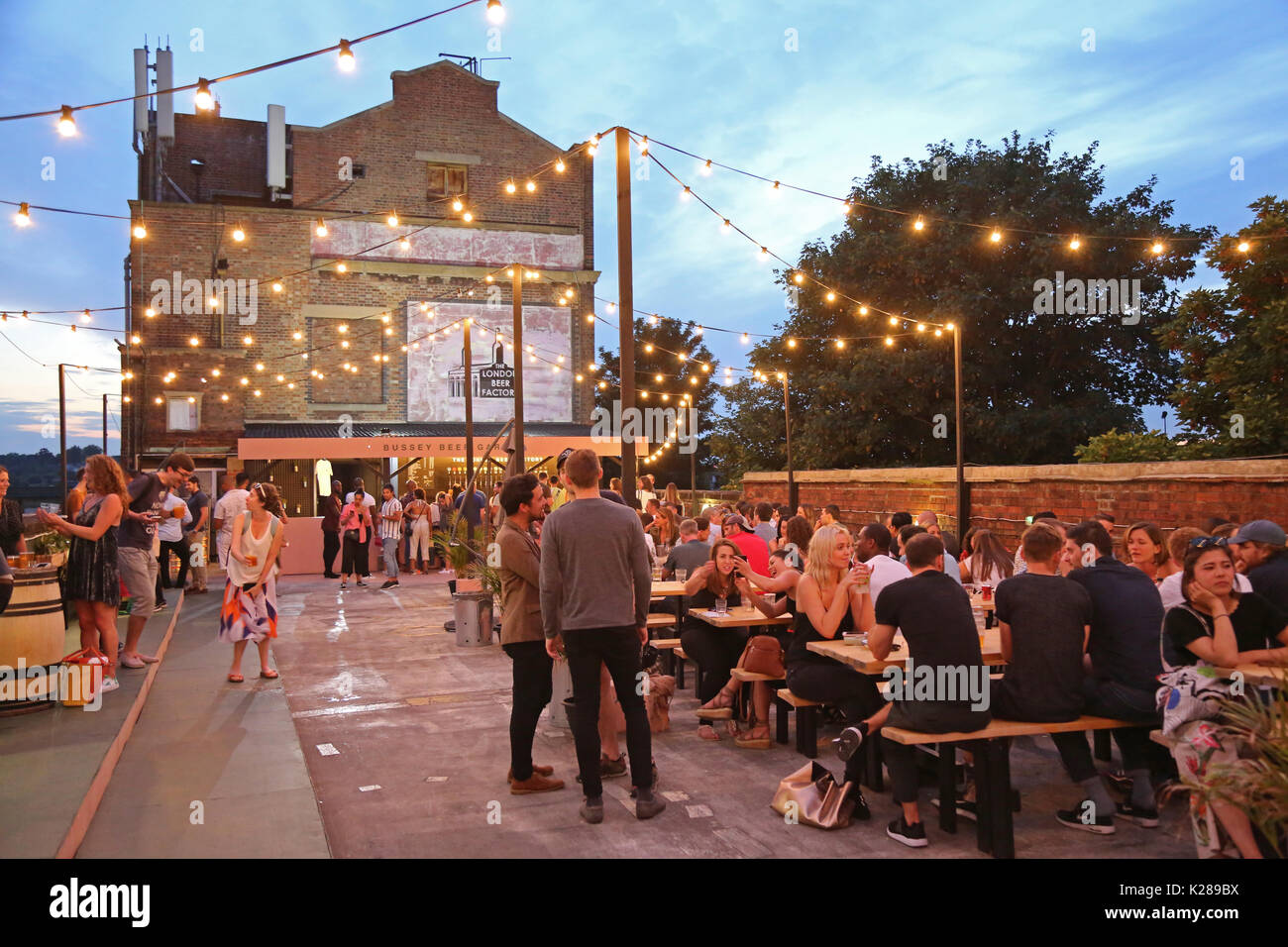 The Bussey Beer Garden, a roof-top bar on Peckham's famous Bussey Building - a Victorian factory now home to artists and creative businesses. Stock Photo