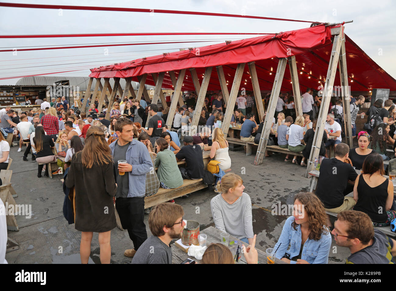 Frank's Café, the famous roof-top bar and restaurant on the multi-storey car park in Peckham, south London, UK. shows the temporary roof and bar area. Stock Photo