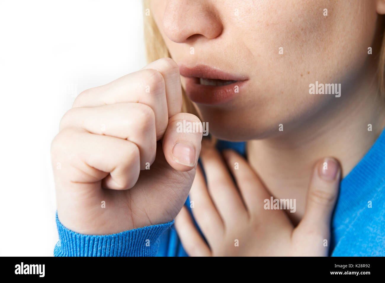 Close Up Of Woman Suffering With Cough Stock Photo
