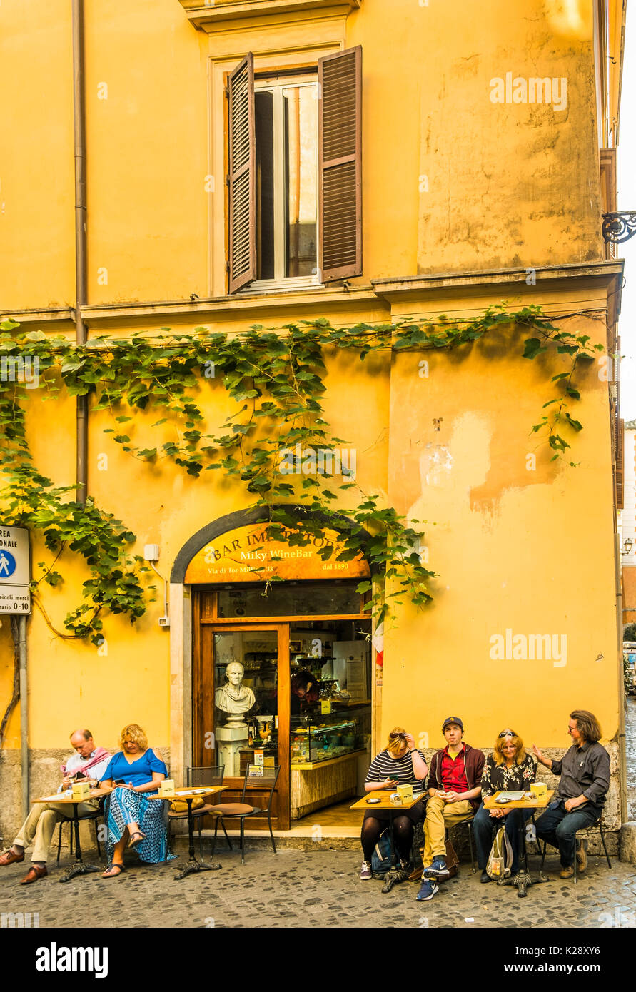 tourists taking a break at bar imperatore in the historic city center Stock Photo