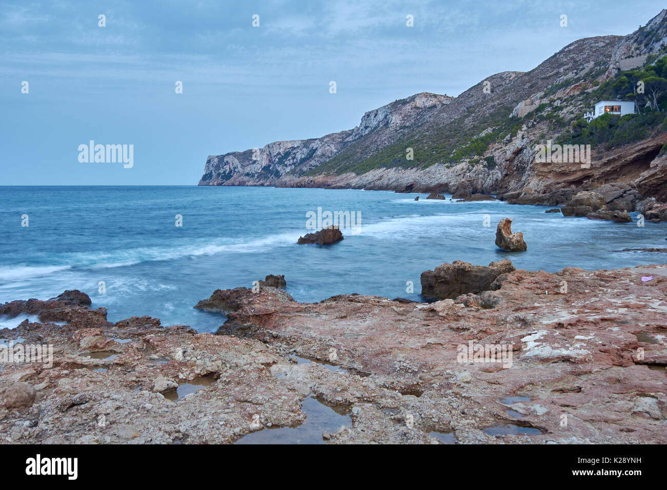 Beautiful place named Les Rotes, located in Denia. Awesome natural park protected from fishing with many species in your waters Stock Photo