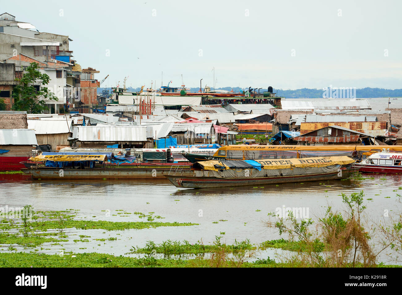 One of the smaller dock areas in Iquitos, Peru, with riverboats docked. Stock Photo