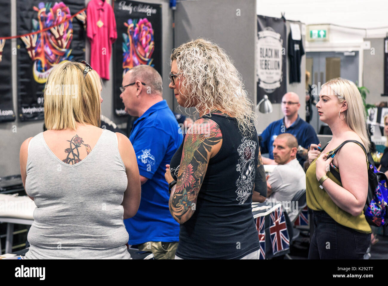 Cornwall Tattoo Convention - a woman with a heavily tattooed arm at the Cornwall Tattoo Convention. Stock Photo