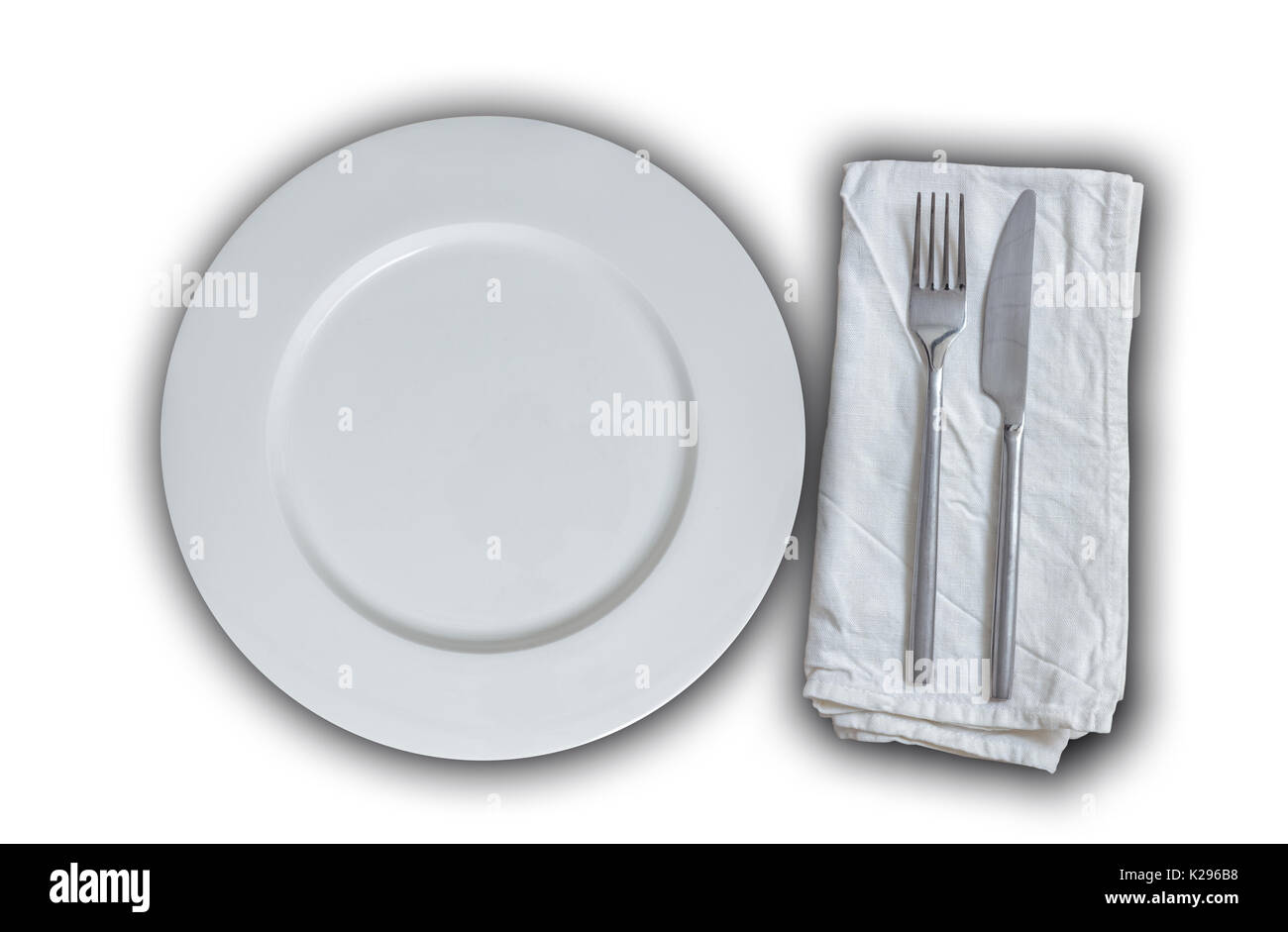 Empty plate with cutlery isolated concept. Stock Photo