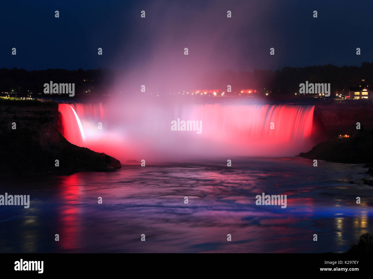 Niagara Falls illuminated at night, Canada and USA Stock Photo