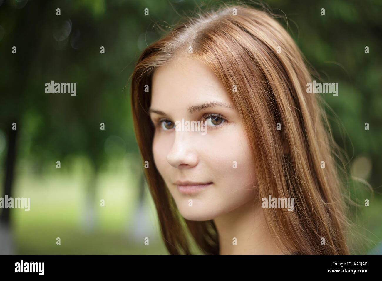 Close up portrait of young beautiful girl with long brown hair Stock ...