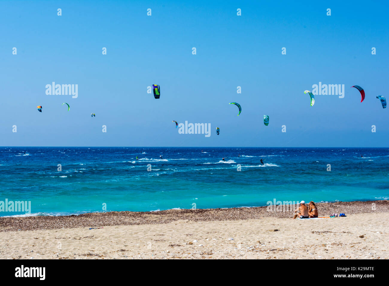 Agios Ioannis beach, Lefkada Island, Greece - August 31 2016: Agios Ioannis  beach in Lefkas island Greece. Colorful power kites span across the sky fr  Stock Photo - Alamy