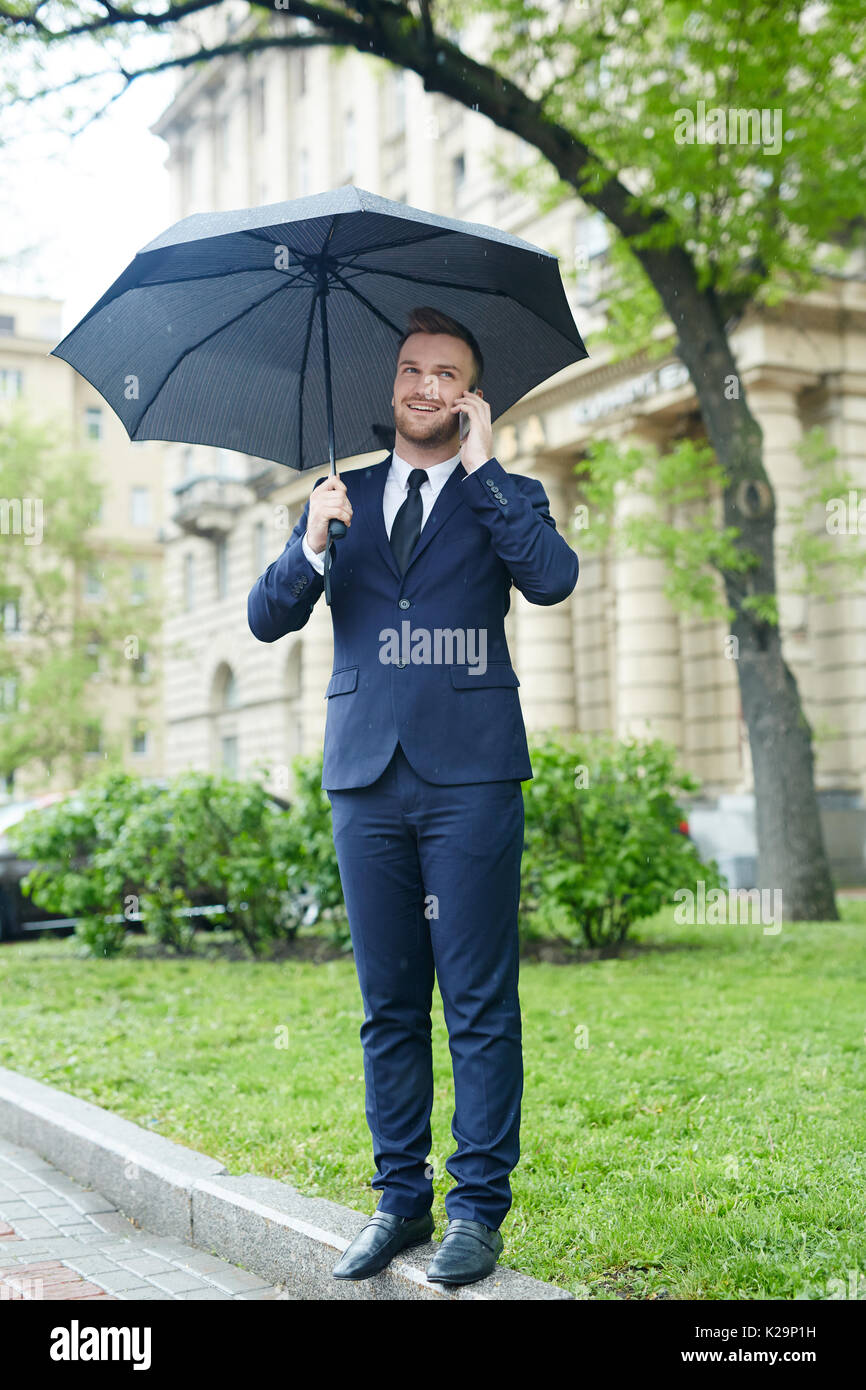 Businessman in park Stock Photo