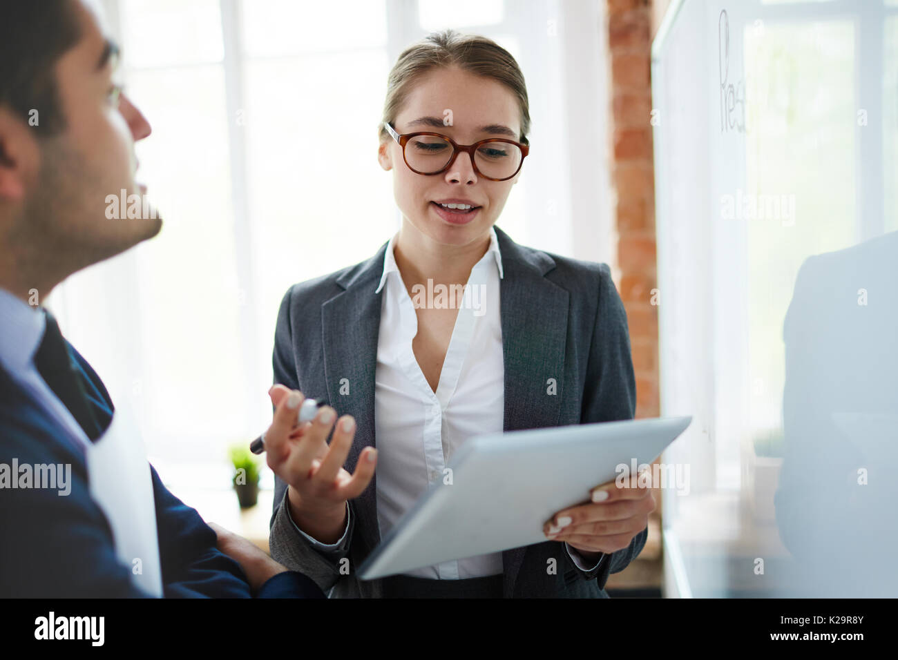 Colleagues interacting Stock Photo