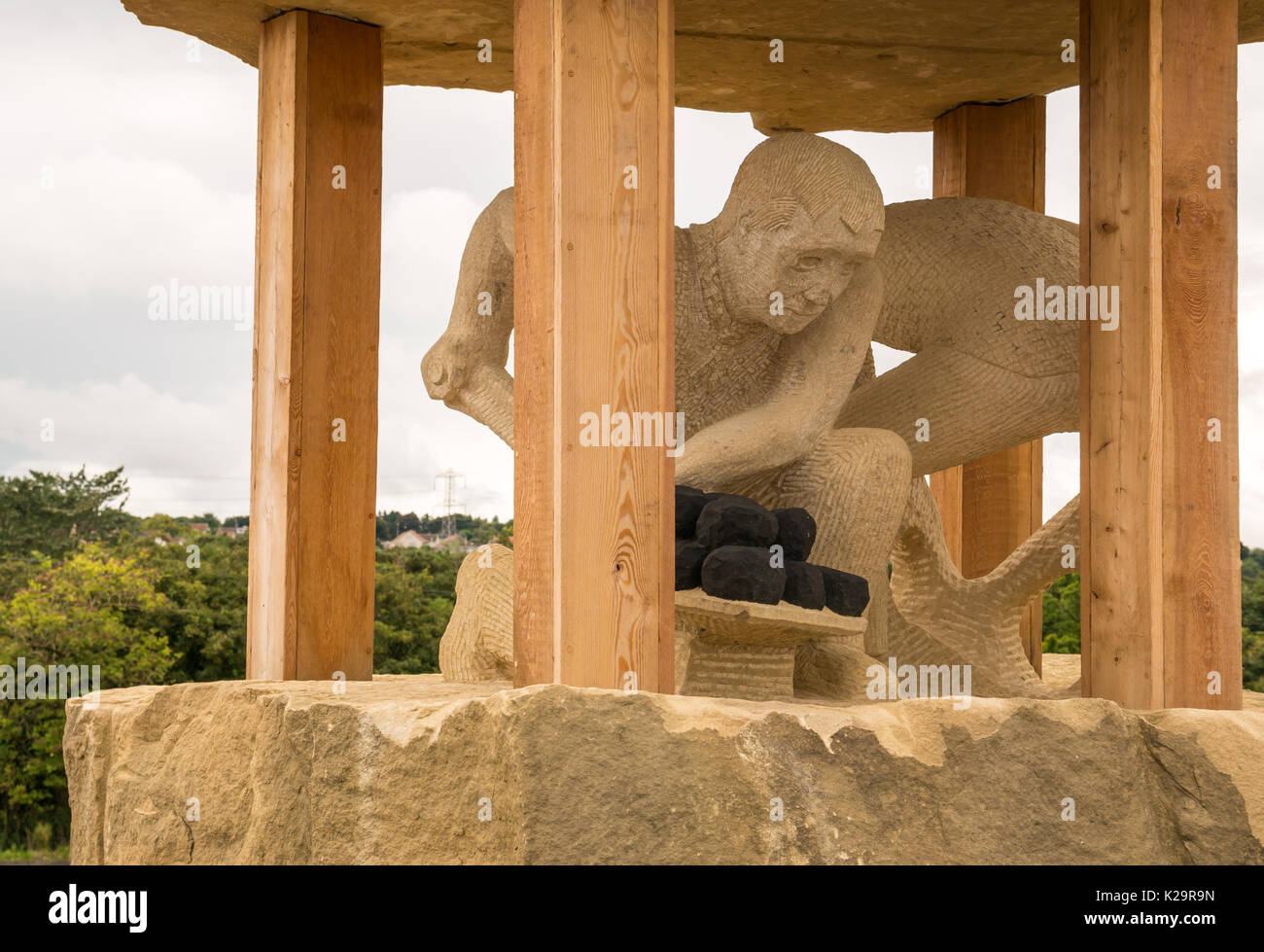 Sandstone monument on site of coal mine air shaft by sculptor Gardner Molloy, a memorial to 200 dead miners, Prestonpans, East Lothian, Scotland, UK Stock Photo