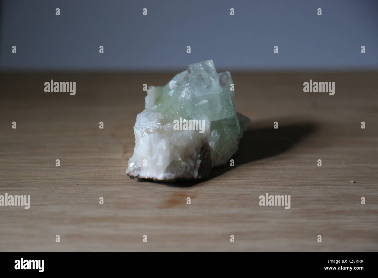 green crystals (green apophyllite) with white rock Stock Photo Alamy