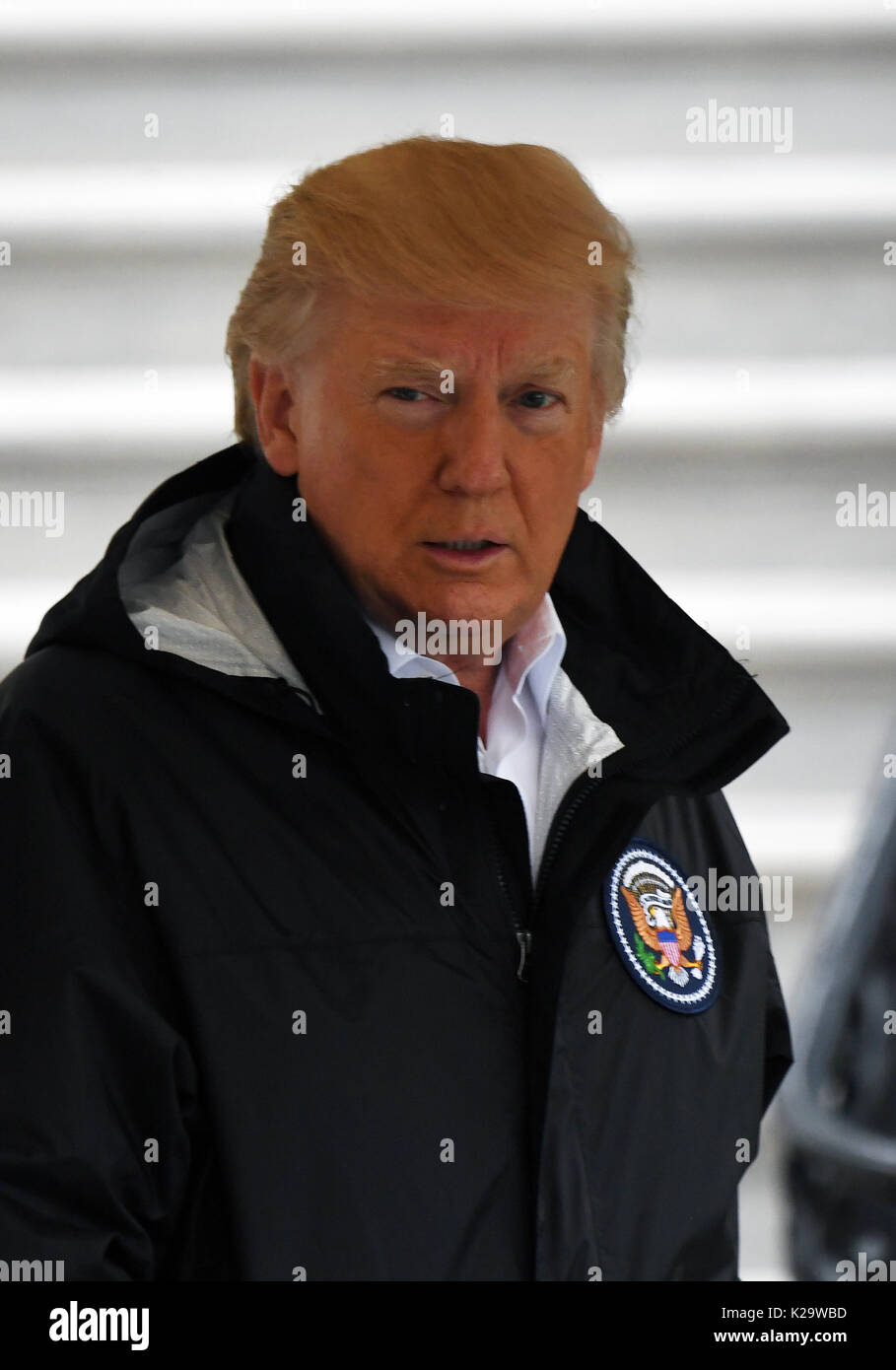 Washington, DC, USA. 29th Aug, 2017. U.S. President Donald Trump walks to board Marine One before departing the White House for Joint Base Andrews, en route to Corpus Christi, Texas, in Washington, DC, the United States, on Aug. 29, 2017. President Donald Trump went to Texas on Tuesday to see the recovery efforts underway in the aftermath of Hurricane Harvey. Credit: Yin Bogu/Xinhua/Alamy Live News Stock Photo