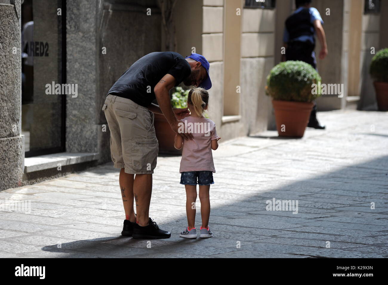 Milan, Borja Valero with her daughter in the center for the first time to know Milan The new purchase of INTER, the Spanish BORJA VALERO, bought by FIORENTINA, arrives for the first time in the center. Taking advantage of the championship stop, Borja Valero brings with her little daughter LUCIA around the city, and after walking all over the quadrilateral, she makes shopping in the 'Rinascente' in Corso Vittorio Emanuele. Stock Photo