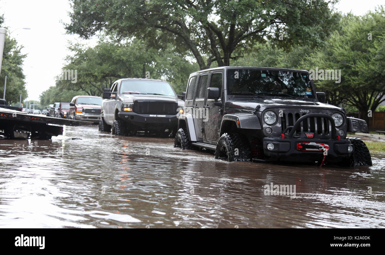 Jeeps in floods hi-res stock photography and images - Alamy