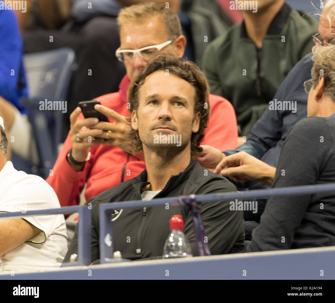 New York, United States. 29th Aug, 2017. New York, NY USA - August 29, 2017: Carlos Moya attends match between Rafael Nadal of Spain and Dusan Lajovic of Serbia during US Open Championships at Billie Jean King National Tennis Center Credit: lev radin/Alamy Live News Stock Photo