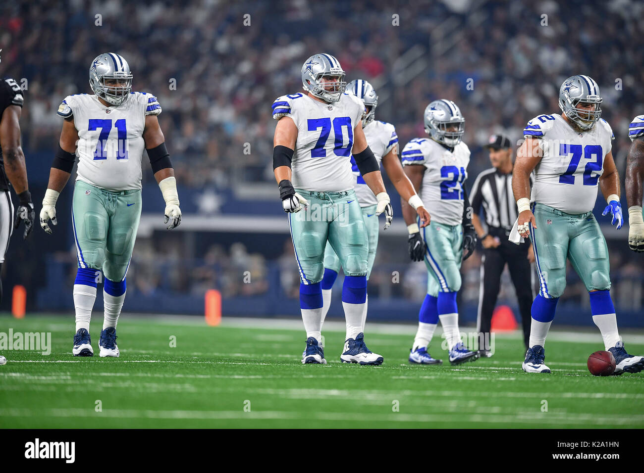 August 26th, 2017:.Dallas Cowboys offensive tackle La'el Collins (71), Dallas  Cowboys guard Zack Martin (70) and Dallas Cowboys center Travis Frederick  (72) during an NFL football game between the Oakland Raiders and