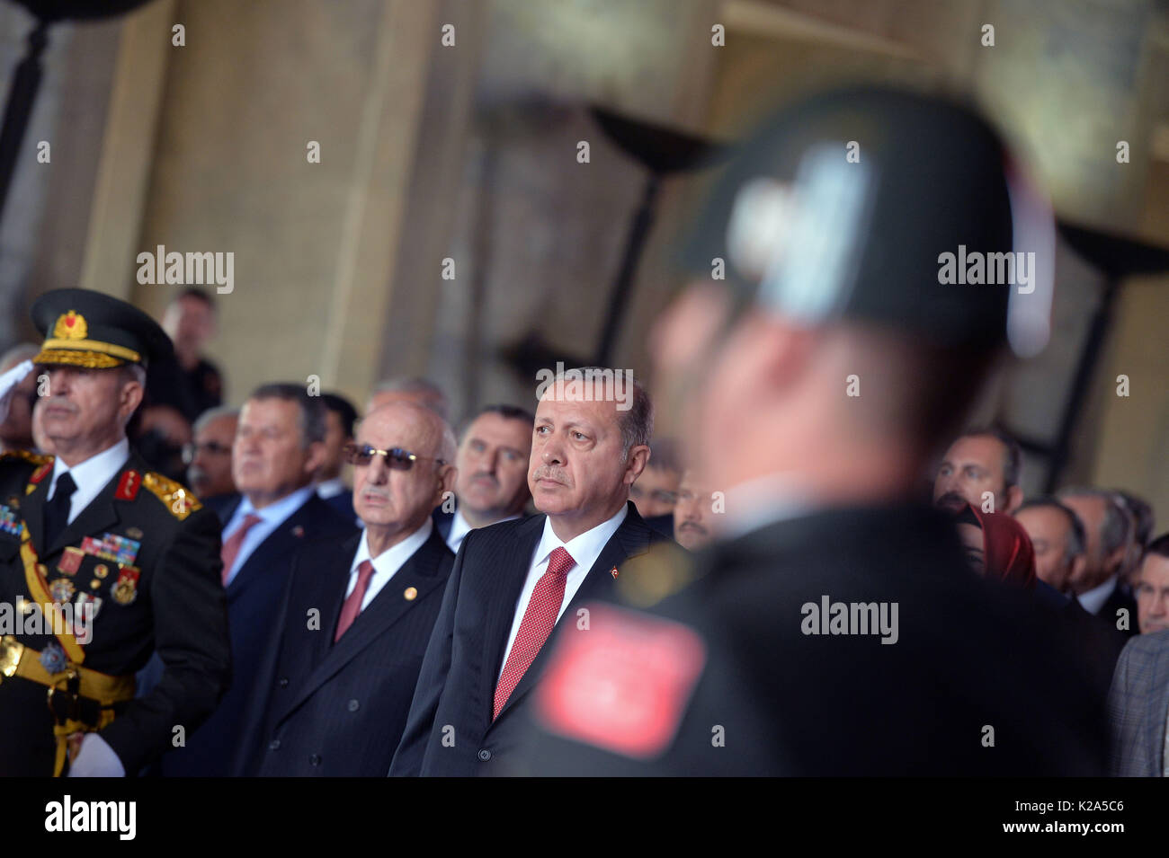 Ankara, Turkey. 30th Aug, 2017. Turkish President Recep Tayyip Erdogan (C) attends a ceremony marking the 95th anniversary of Victory Day in Ankara, Turkey, on Aug. 30, 2017. Turkey celebrated on Wednesday the 95th anniversary of Victory Day, which marks the Turkish victory against Greek forces at the Battle of Dumlupinar, the final battle of the Turkish War of Independence in 1922. Credit: Mustafa Kaya/Xinhua/Alamy Live News Stock Photo