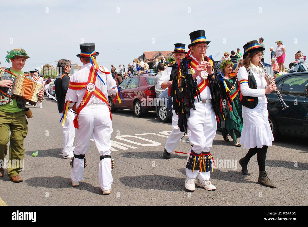The Mad Jacks morris dancers perform during the parade on the West Hill at the Jack In The Green festival in Hastings, England on May 5, 2014. Stock Photo
