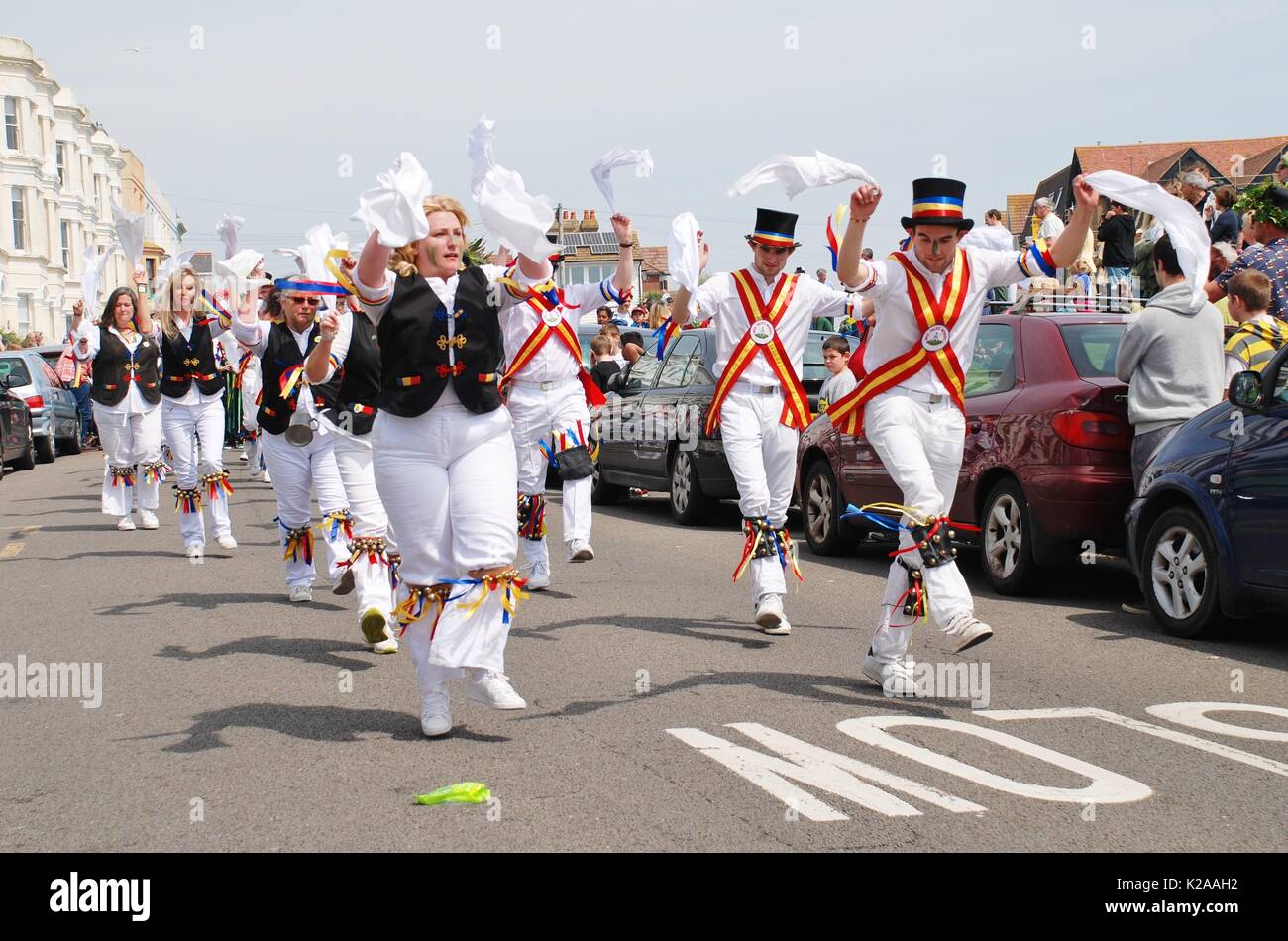 The Mad Jacks morris dancers perform during the parade on the West Hill at the Jack In The Green festival in Hastings, England on May 5, 2014. Stock Photo