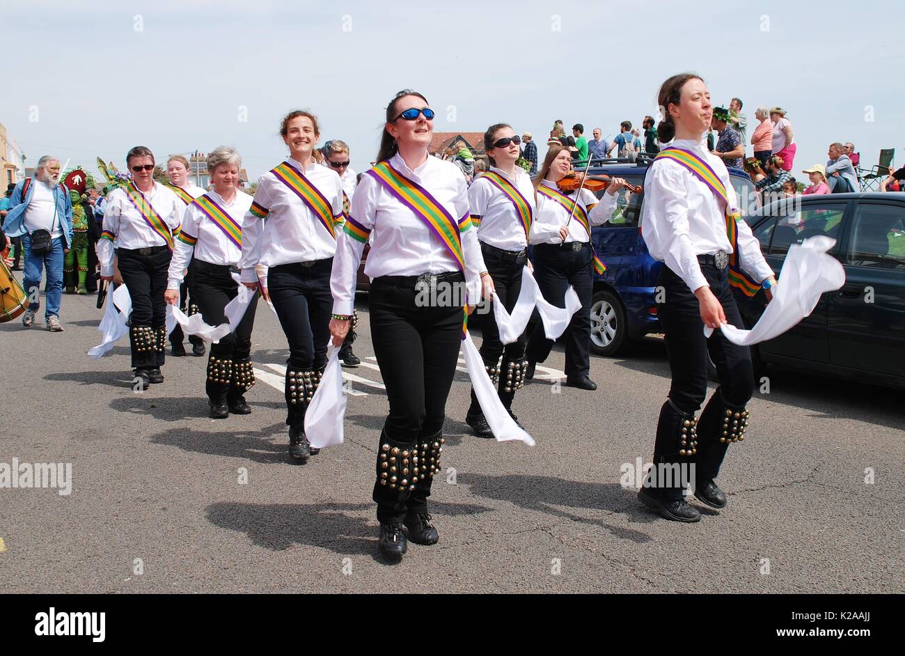 The New Esperance morris dancers perform during the parade on the West Hill at the Jack In The Green festival in Hastings, England on May 5, 2014. Stock Photo