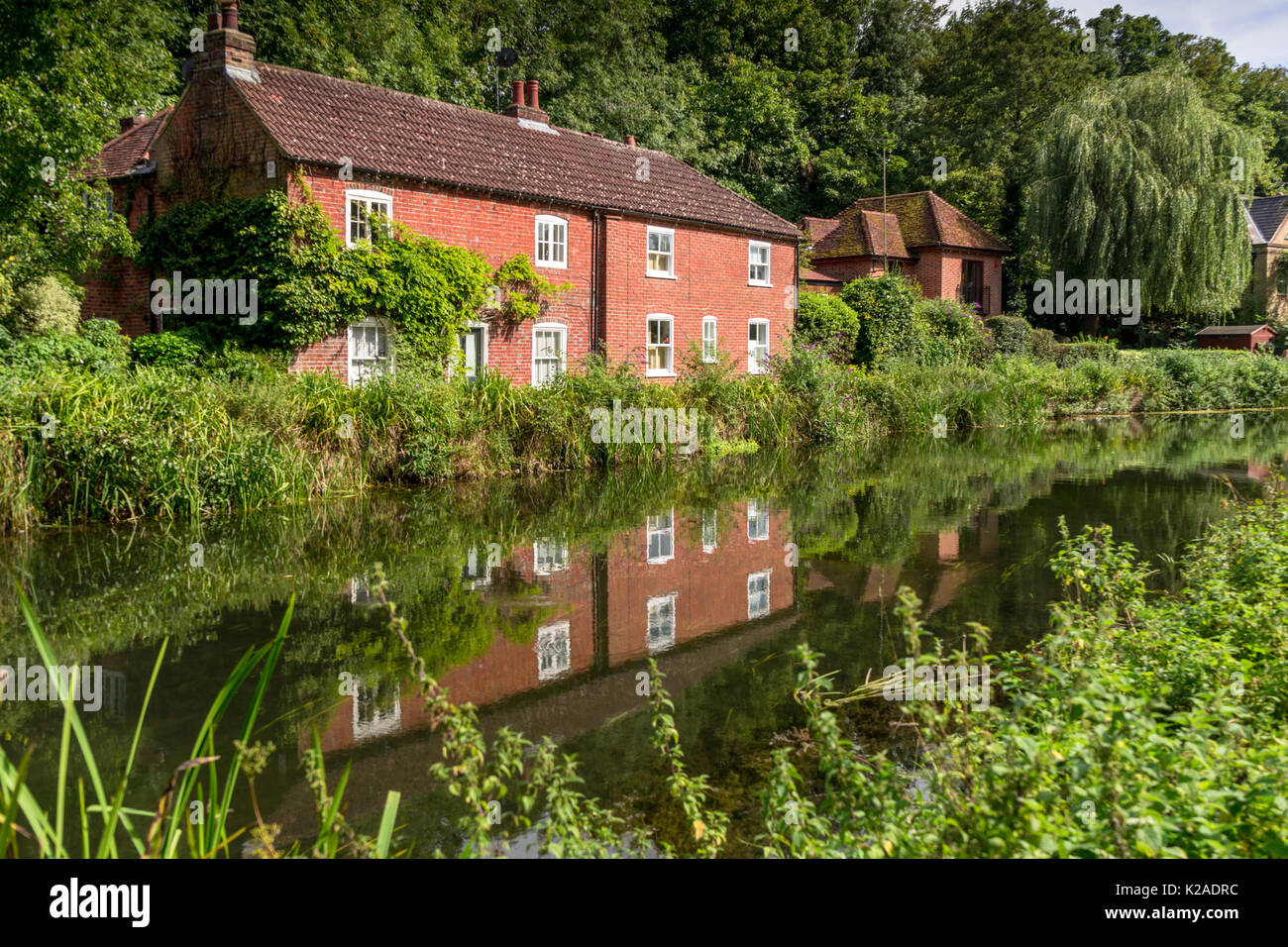Riverside cottage along the River Itchen Navigation, Winchester, Hampshire in 2017, UK Stock Photo